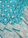 Exquisite Teal Banarasi Silk Saree with Floral Jaal & Silver Zari