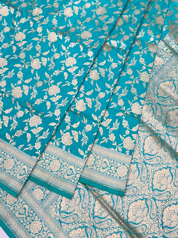 Exquisite Teal Banarasi Silk Saree with Floral Jaal & Silver Zari