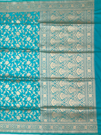 Exquisite Teal Banarasi Silk Saree with Floral Jaal & Silver Zari