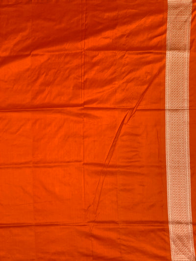 Exquisite Vibrant Orange Banarasi Silk Saree with Silver Zari Rose Motifs