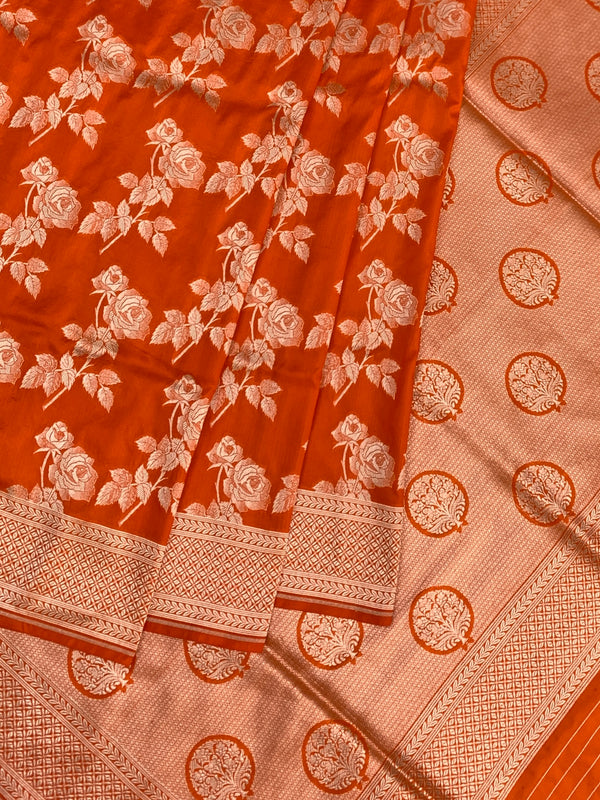 Exquisite Vibrant Orange Banarasi Silk Saree with Silver Zari Rose Motifs
