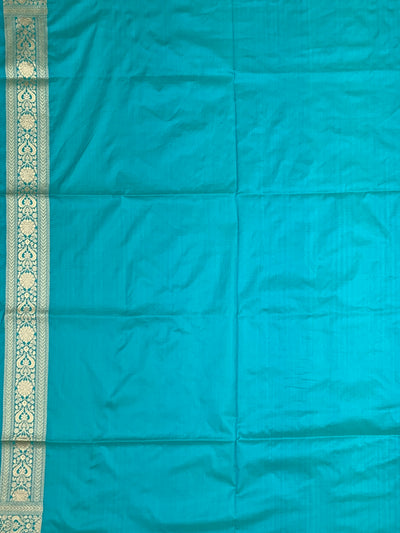 Exquisite Teal Banarasi Silk Saree with Floral Jaal & Silver Zari