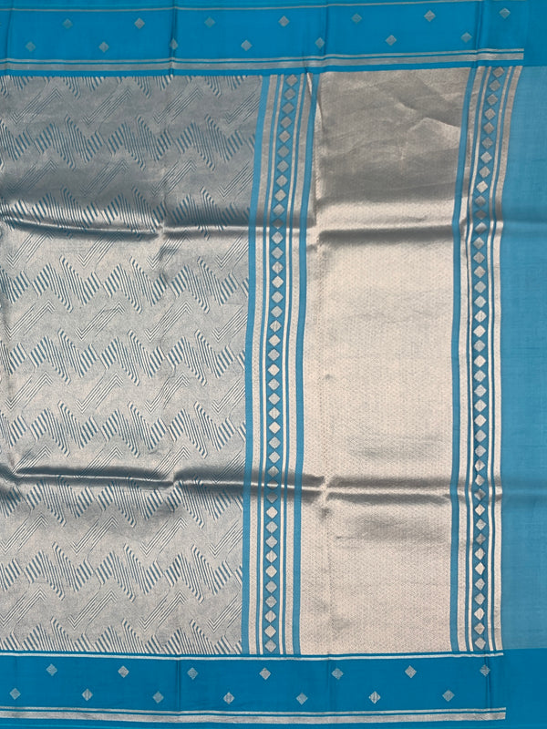 Exquisite Silver Brocade Silk Kora Saree with Cerulean Blue Border