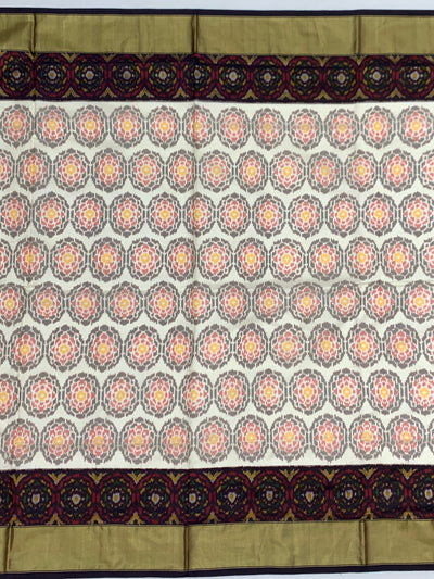 Exquisite Handloom Cream Ikat Silk Saree
