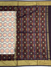 Exquisite Handloom Cream Ikat Silk Saree