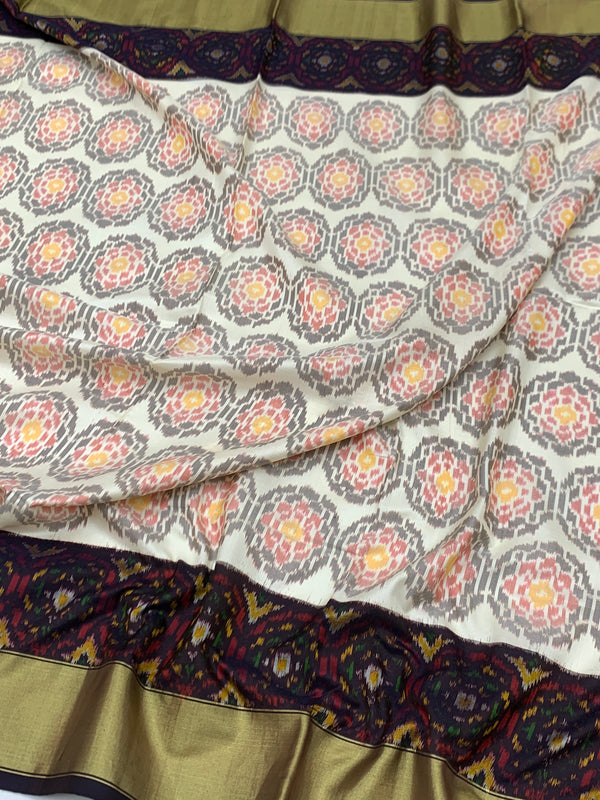 Exquisite Handloom Cream Ikat Silk Saree