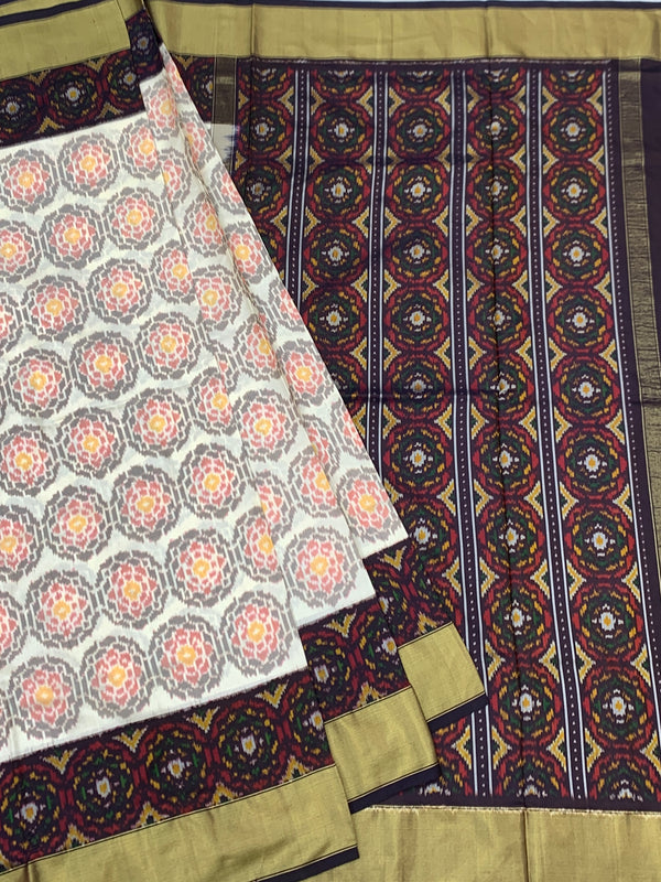 Exquisite Handloom Cream Ikat Silk Saree
