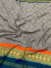 Exquisite Handloom Ikat Silk Saree in Dove Grey & Indigo