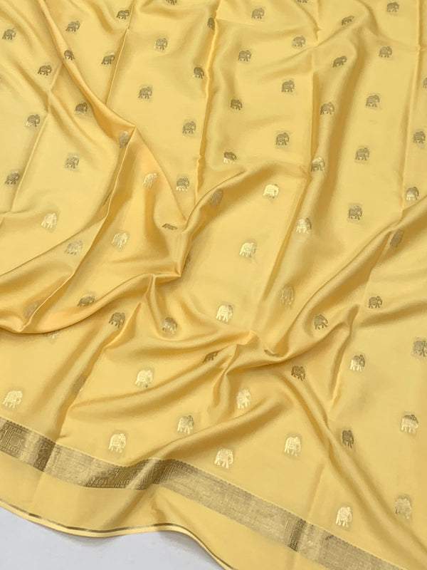 Exquisite Pale Yellow Mysore Silk Saree with Elephant Zari Buttas