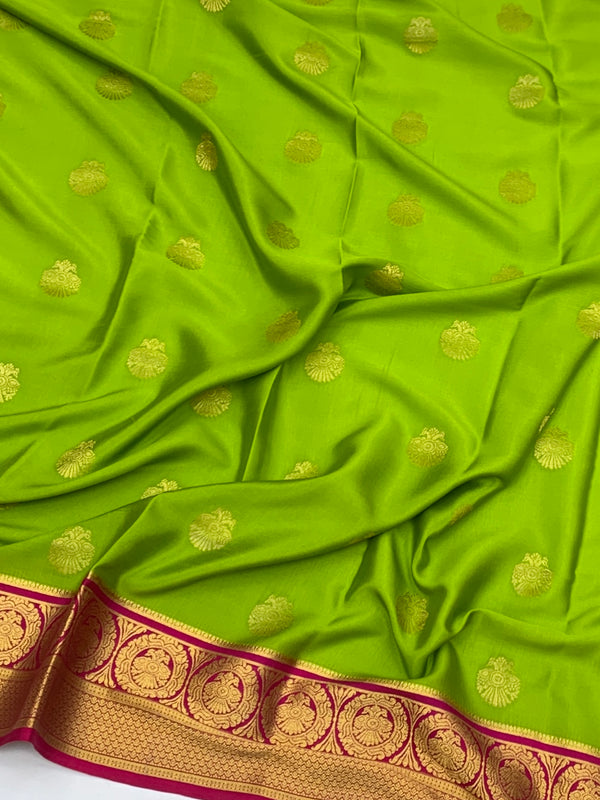 Exquisite Green & Rani Pink Mysore Silk Saree