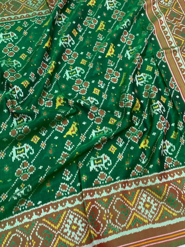 Exquisite Emerald Green Patola Saree with Traditional Elephant Motifs