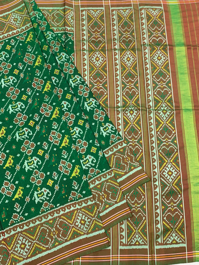 Exquisite Emerald Green Patola Saree with Traditional Elephant Motifs