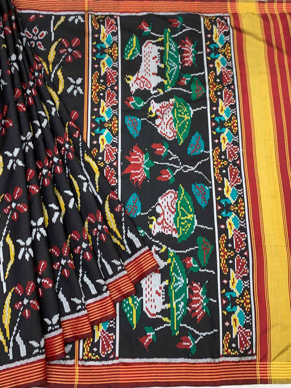 Heritage Black Patola Silk Saree with Sacred Kamdhenu & Lotus Motifs