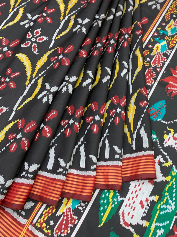 Heritage Black Patola Silk Saree with Sacred Kamdhenu & Lotus Motifs