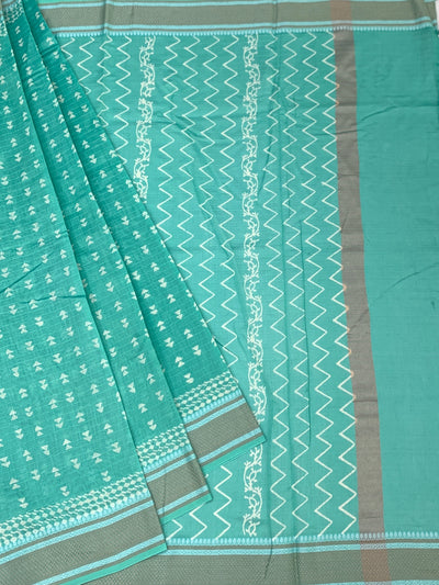Elegant Sea Green Cotton Saree with Geometric Weave