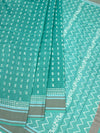 Elegant Sea Green Cotton Saree with Geometric Weave