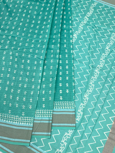 Elegant Sea Green Cotton Saree with Geometric Weave