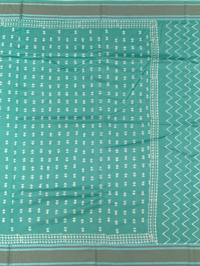Elegant Sea Green Cotton Saree with Geometric Weave
