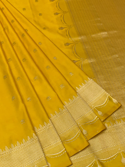 Sunflower Yellow Mashru Silk Saree with Scalloped Tassel Border