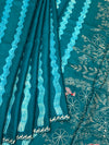 Deep Teal Tussore Silk Saree with Botanical Threadwork & Wavy Accents