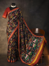 Heritage Black Patola Silk Saree with Sacred Kamdhenu & Lotus Motifs